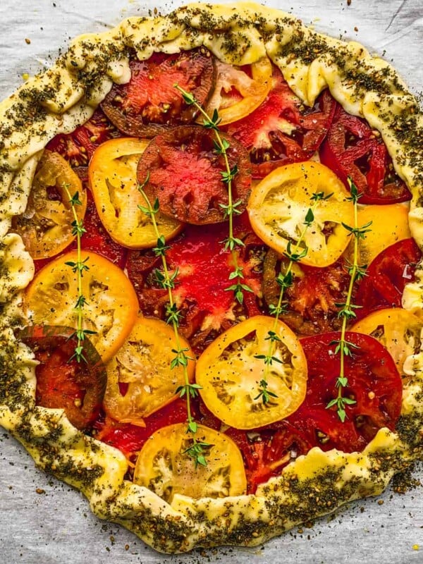 Tomato Galeette with za'atar and thyme garnish.
