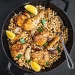 chicken and pearl couscous in a platter.