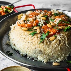 Upside down rice and vegetable dish on a platter.