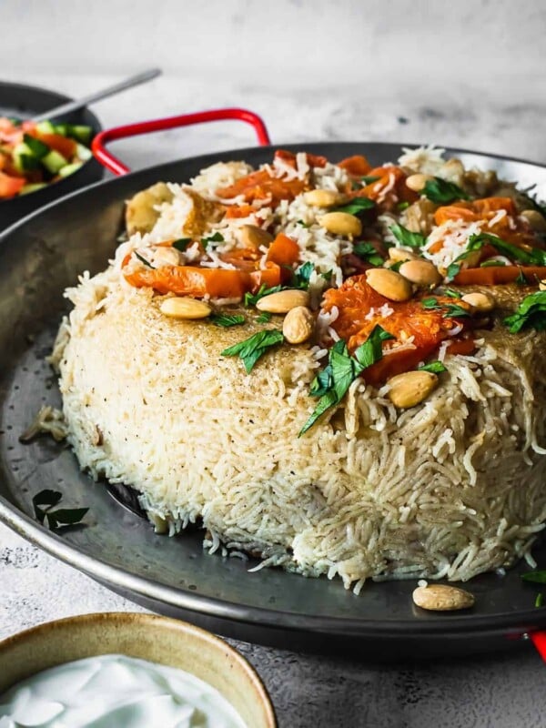 Upside down rice and vegetable dish on a platter.