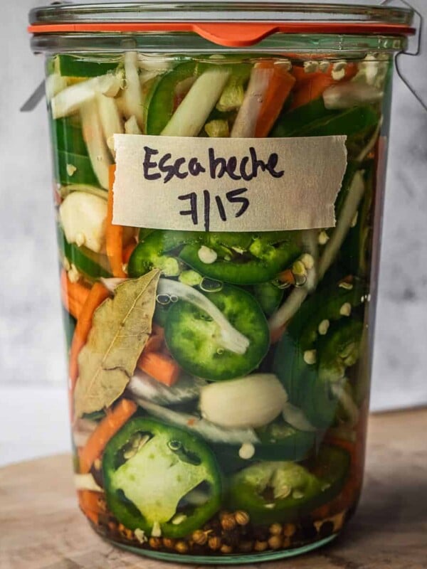 Mason jar full of Mexican pickled vegetables.