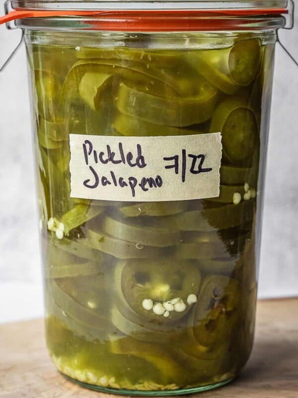 Mason jar full of quick pickled jalapenos.