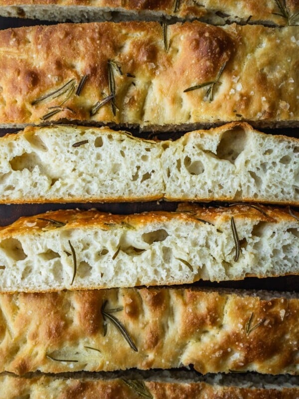 No Knead Focaccia slices on a board.