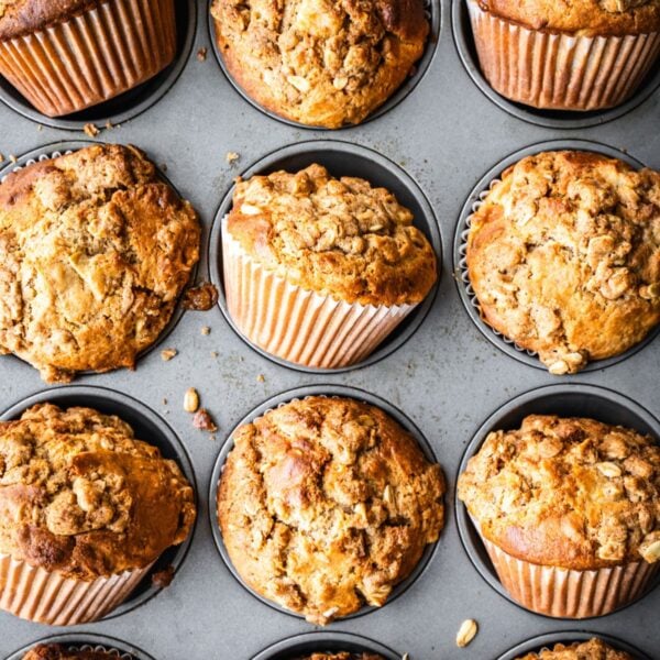 Apple oatmeal muffins in a muffin tin.