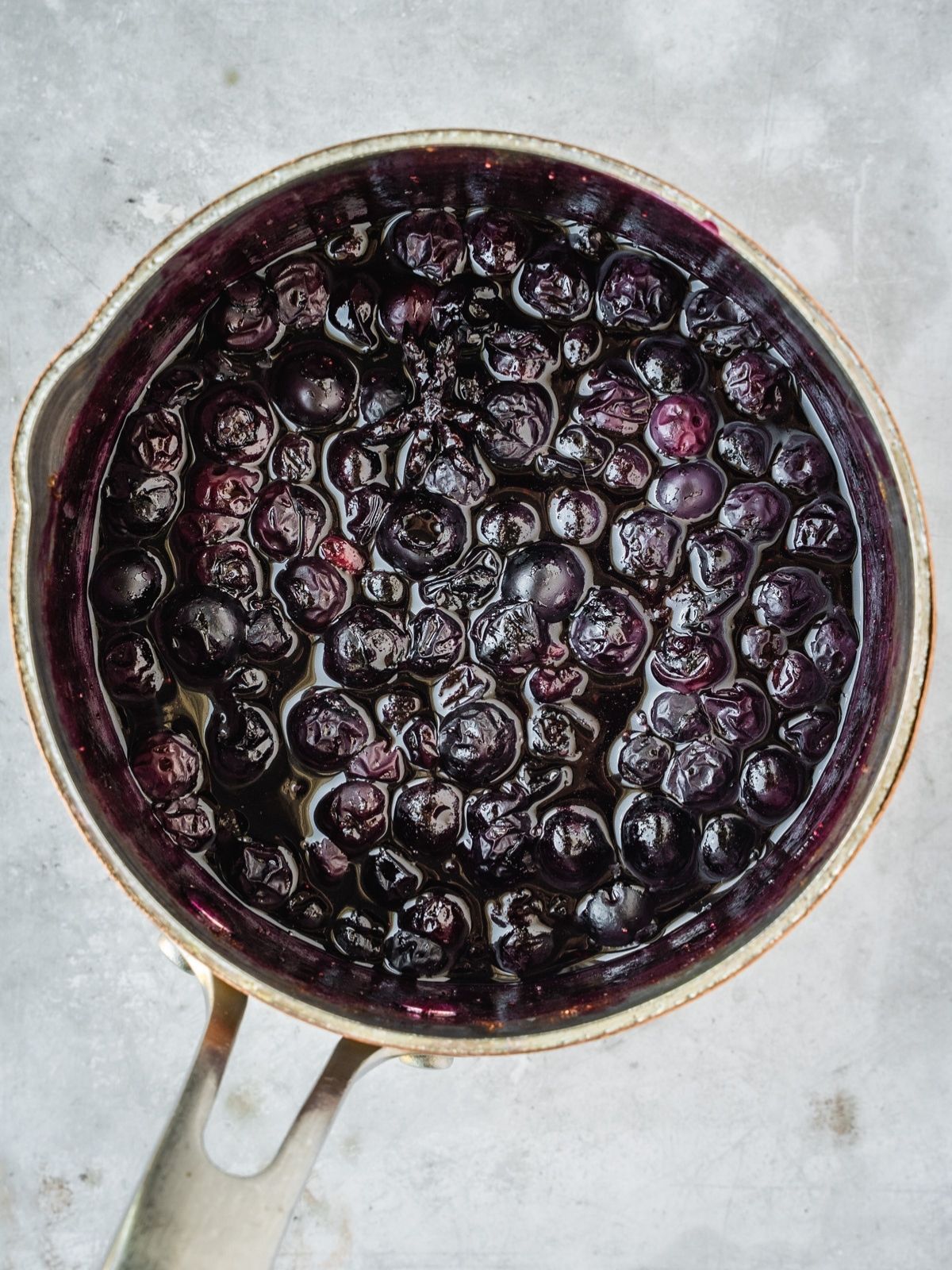 Blueberry Maple Compote in a saucepan.