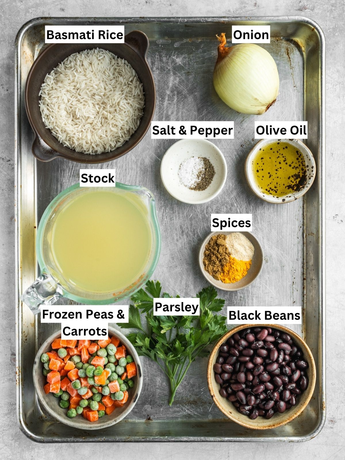 Middle Eastern Vegetable Rice Pilaf recipe ingredients with individual labels on a metal tray.