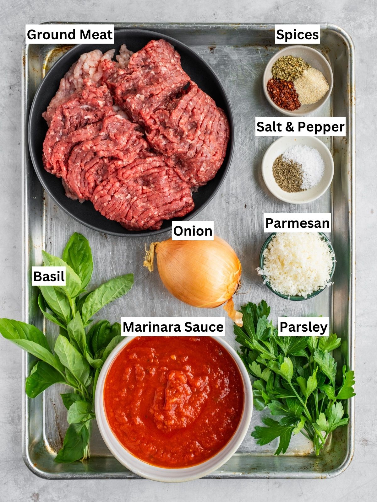 Italian Meatballs in Sauce recipe ingredients with individual labels on a metal tray.