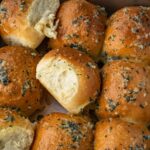 Garlic Butter Dinner Rolls in a baking tray.