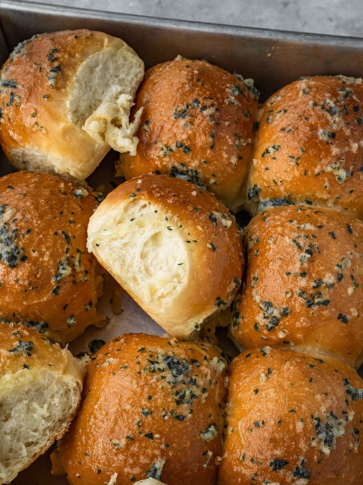Garlic Butter Dinner Rolls in a baking tray.