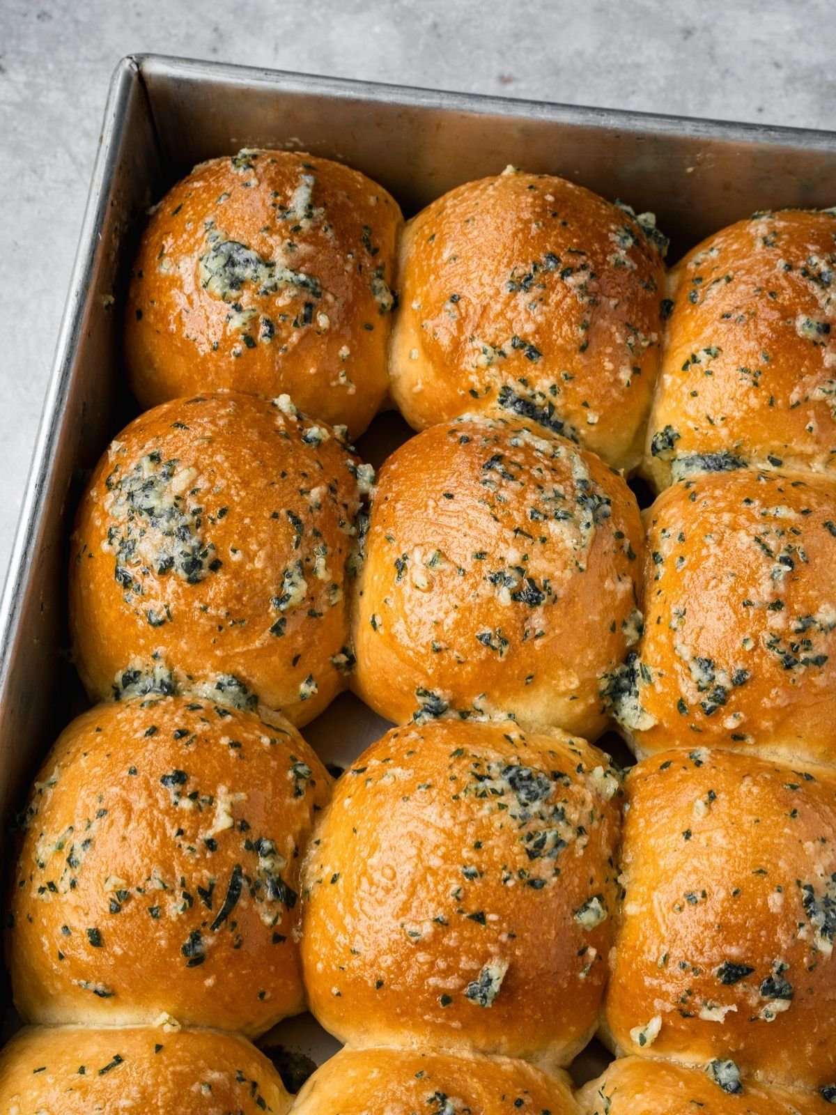 Garlic Butter Dinner Rolls in a baking tray.