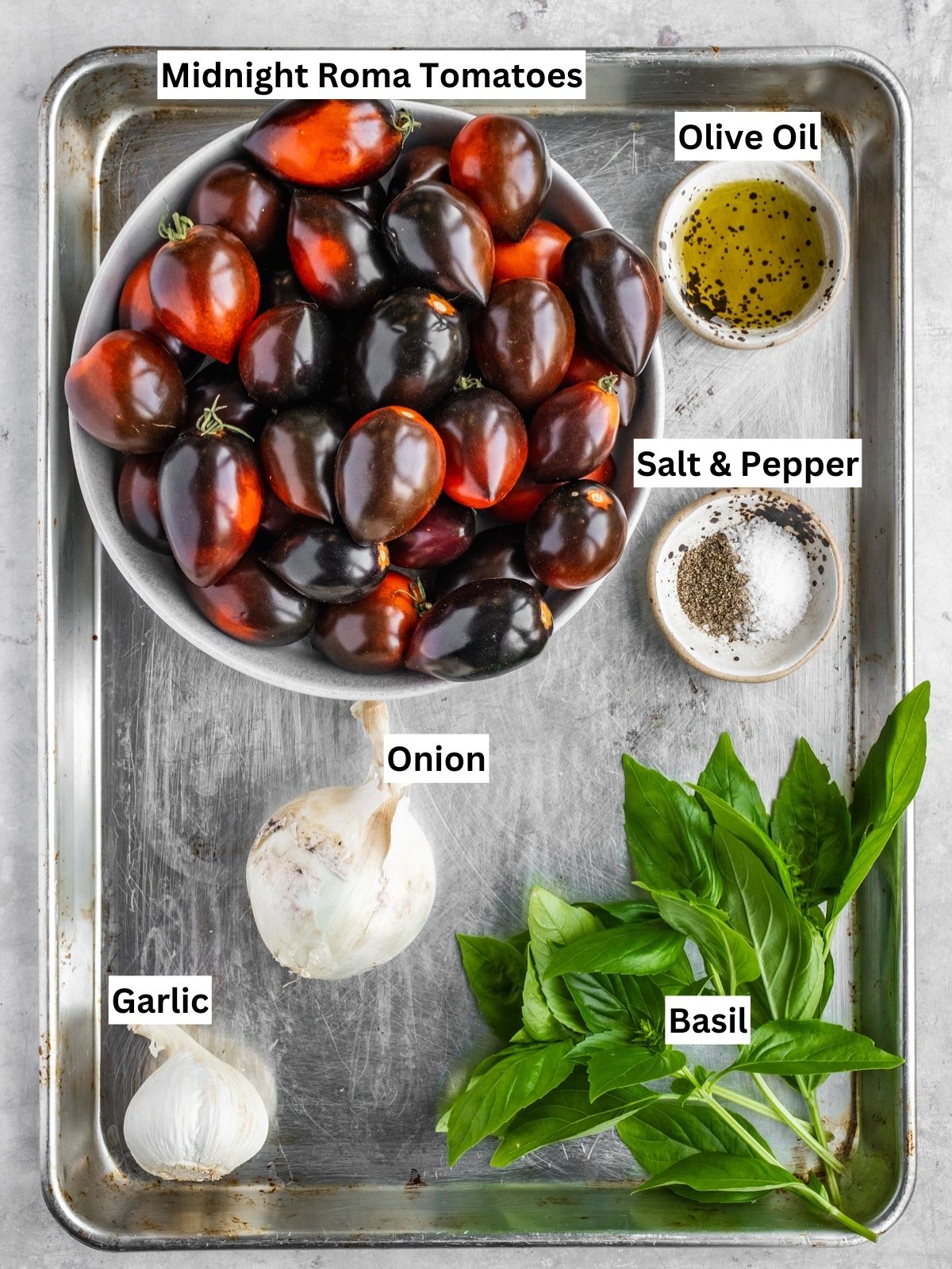 Midnight Roma Tomato sauce recipe ingredients with individual labels on a metal tray.