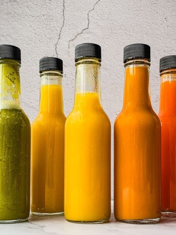 A lineup of hot sauce bottle.