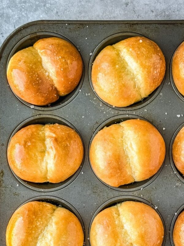 Double cheeked buns in a muffin tin.