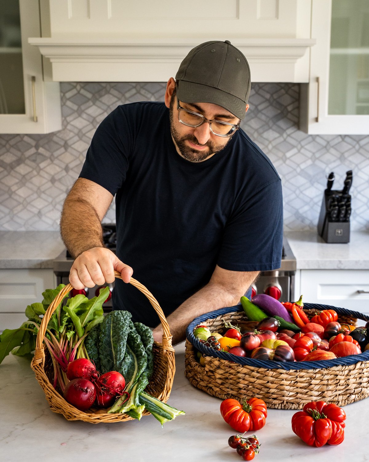 Photo of Luay Ghafari in a kitchen.