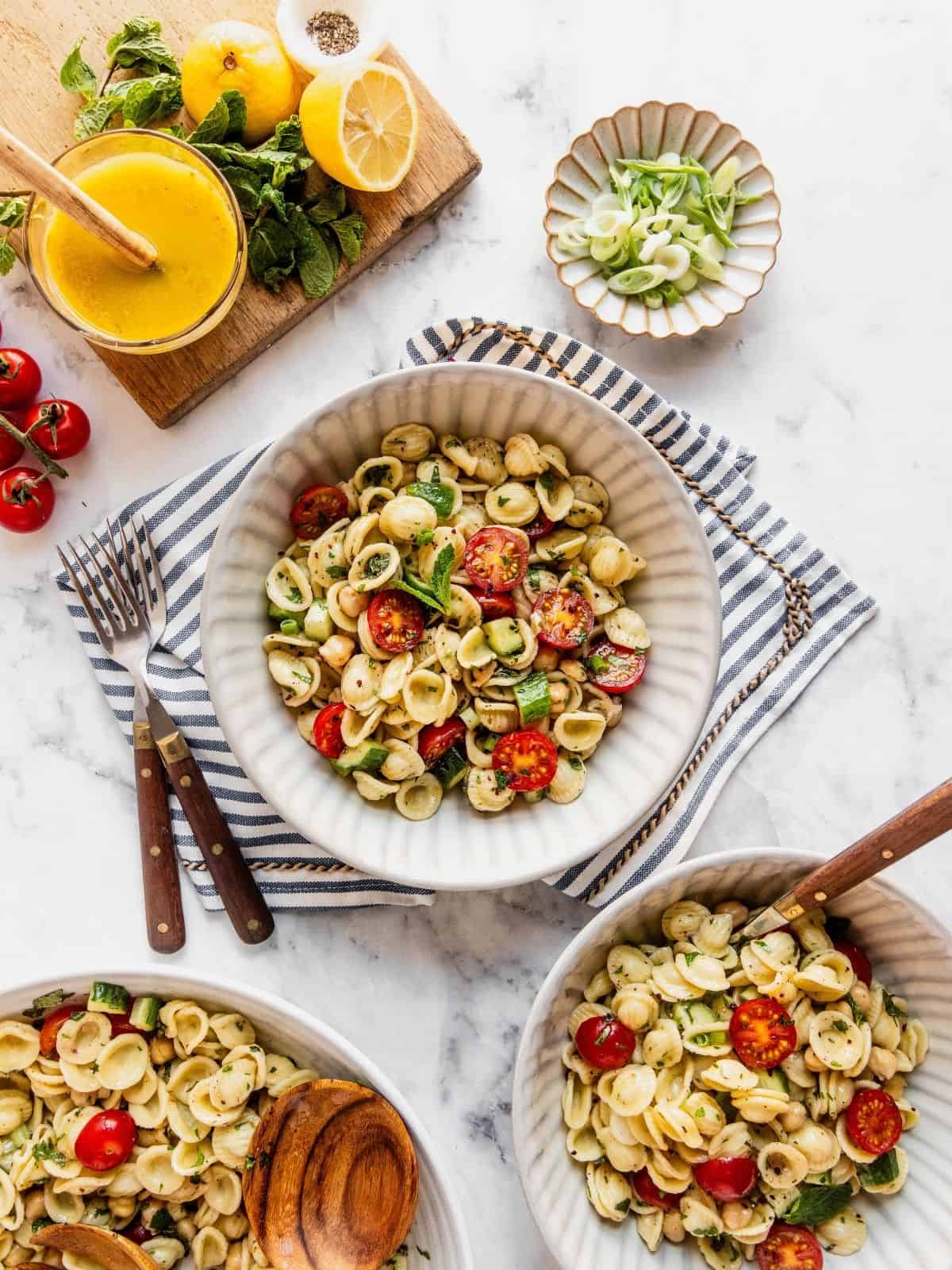Mediterranean Chickpea Pasta Salad portions in small bowls.