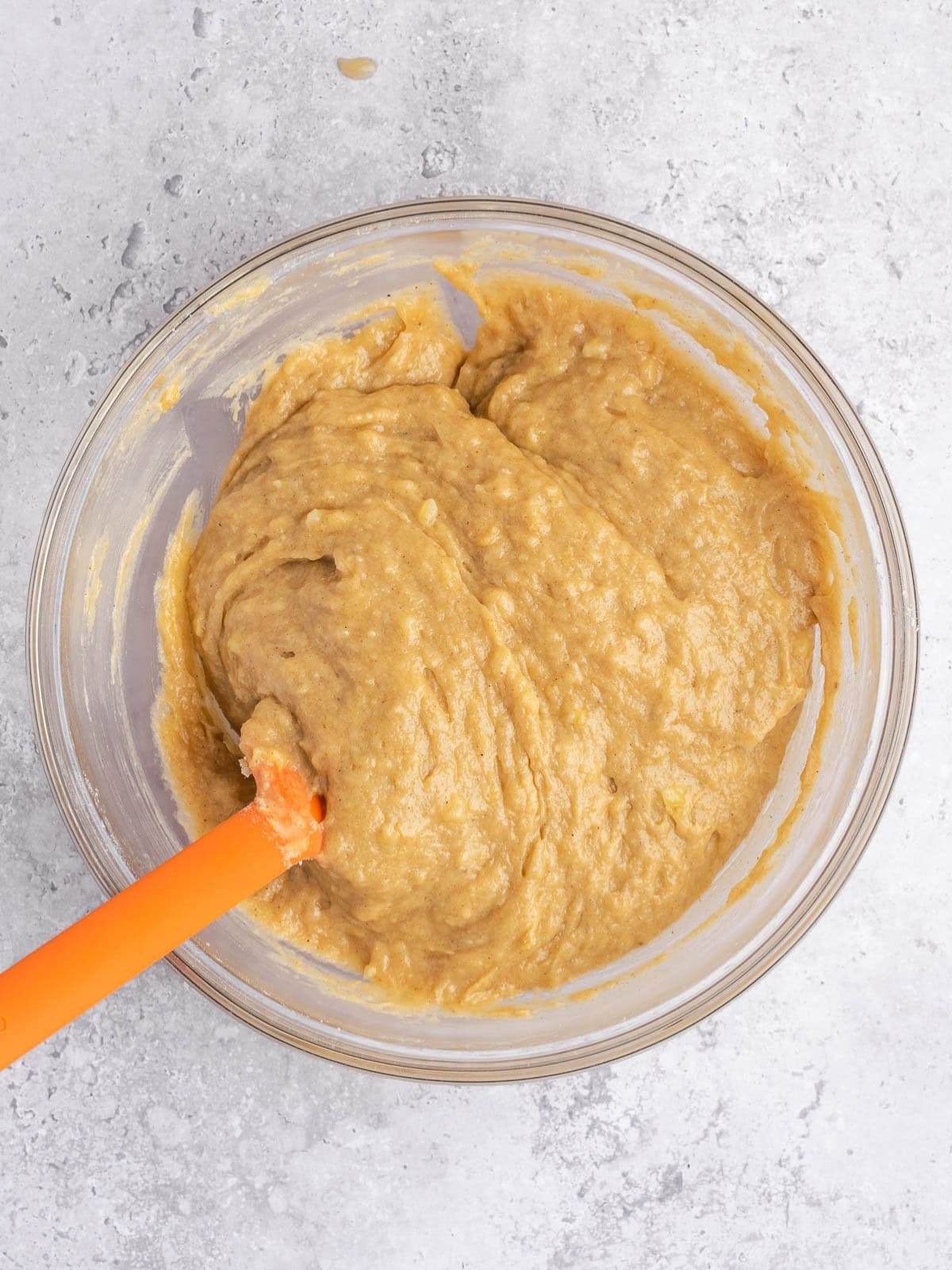Mixing bowl showing the final consistency of the tahini banana bread batter.