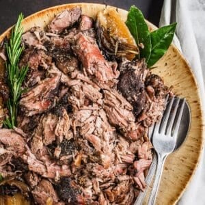 Platter with shredded pulled lamb.