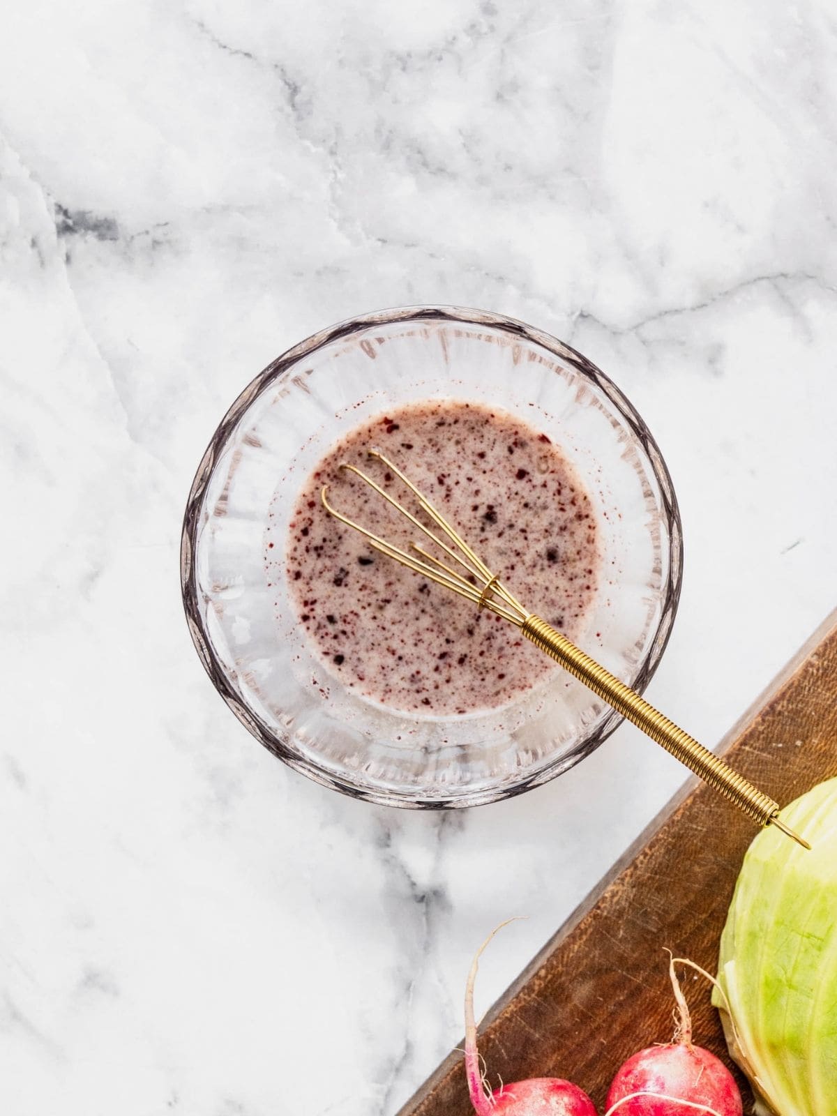 Small bowl with lemon sumac dressing.