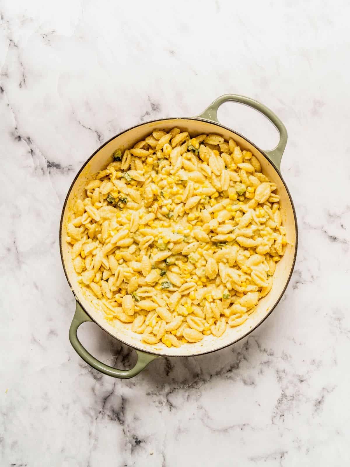 Pasta tossed in the creamy corn and zucchini sauce.