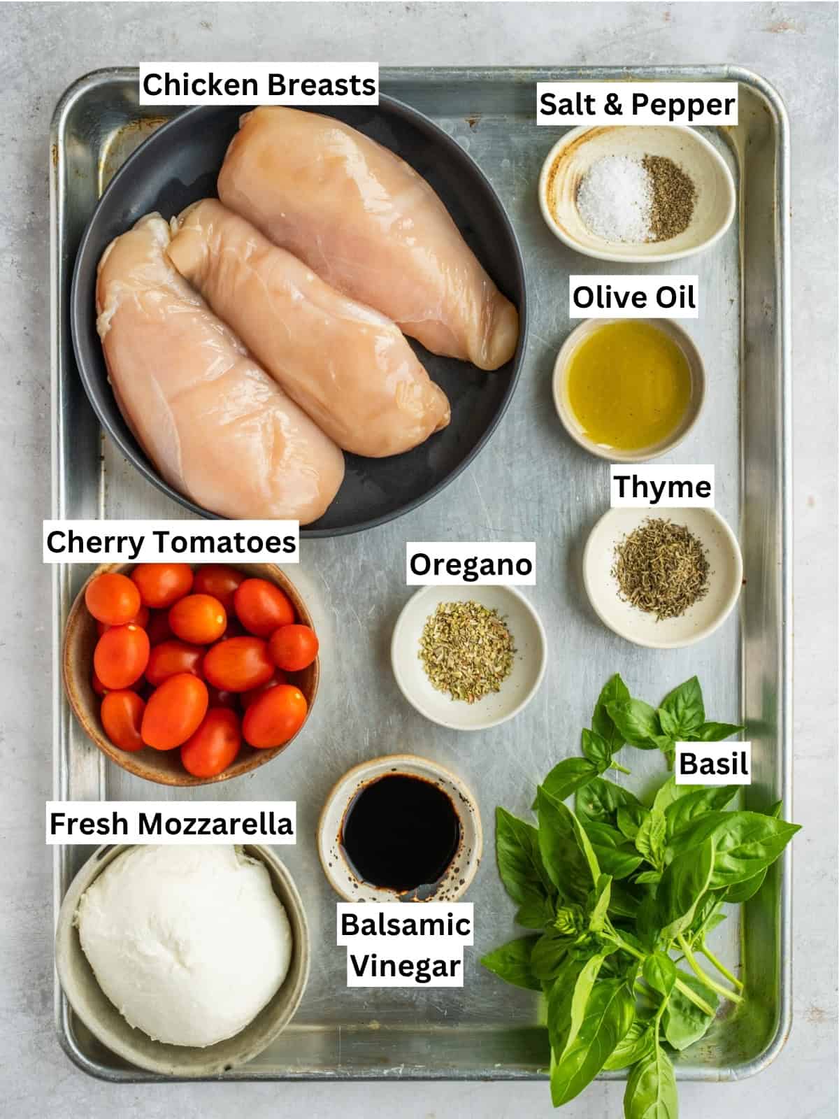 Grilled Chicken Margherita recipe ingredients with individual labels on a metal tray.
