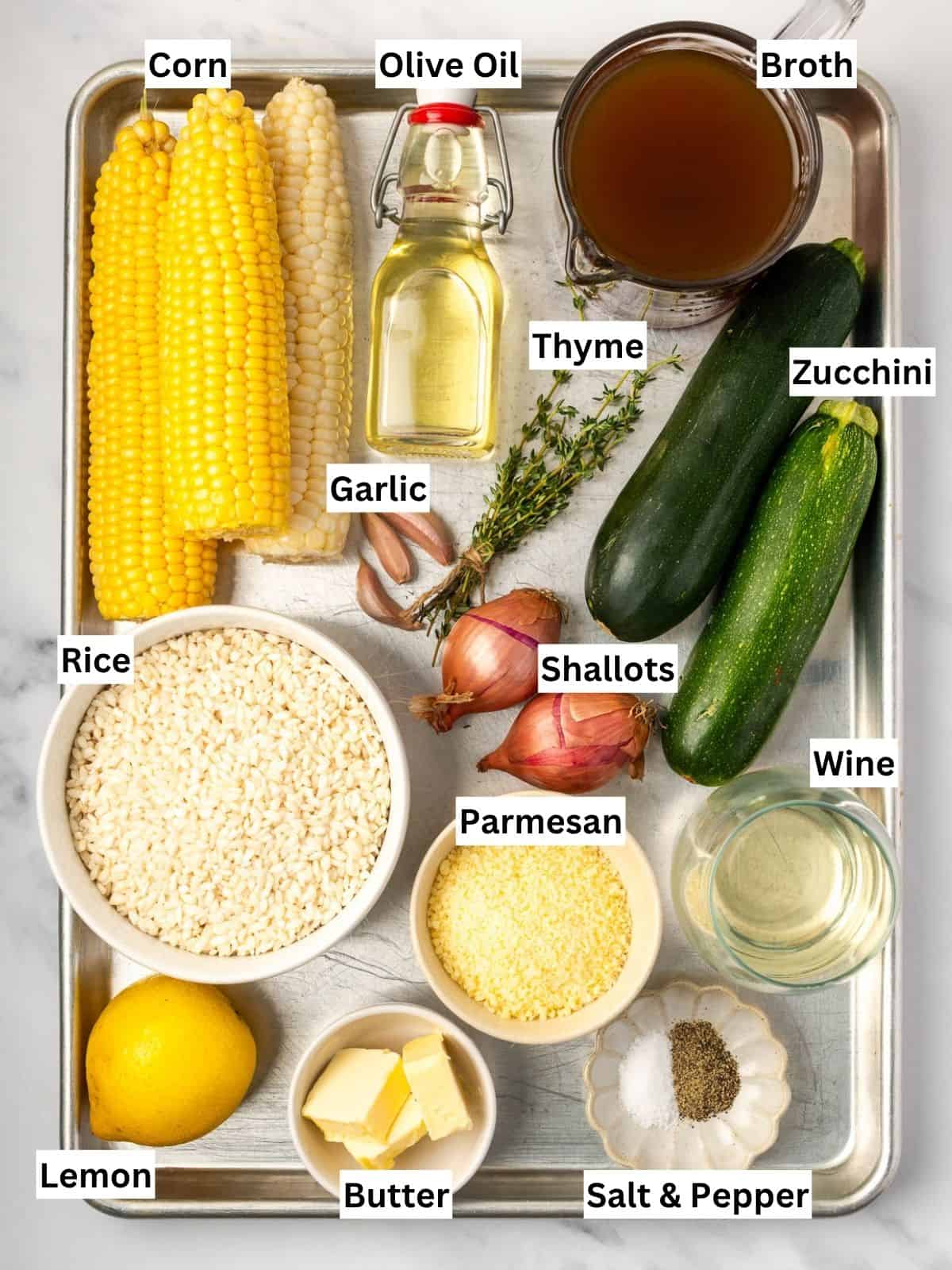 Summer risotto recipe ingredients with individual labels on a metal tray.